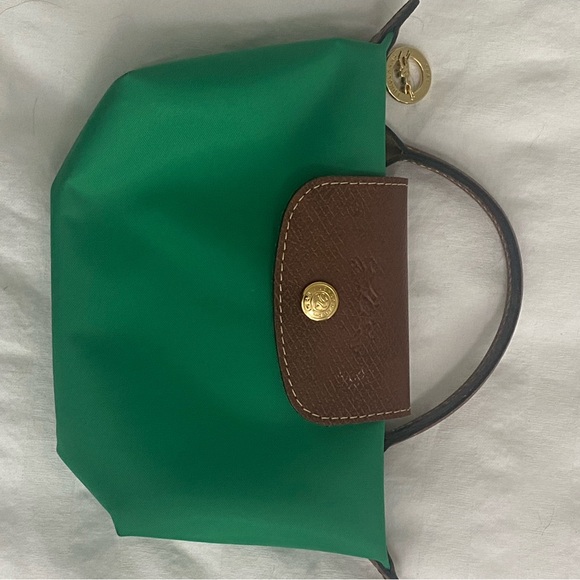 Longchamp Handbags - Longchamp Green and Brown Cosmetic Bag with Classic Design